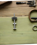 Heavy Duty Stainless Steel T Track Clamping Bolts Four Pack With Ergonomic Star Knobs Pro Woodworking Jig Hardware on green wood.