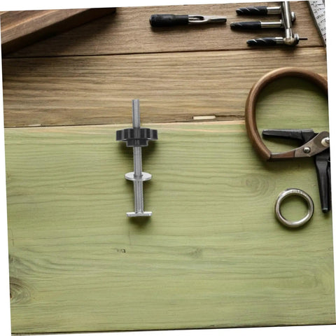 Heavy Duty Stainless Steel T Track Clamping Bolts Four Pack With Ergonomic Star Knobs Pro Woodworking Jig Hardware on green wood.