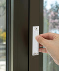 Window Sash Lift Handle 3 Inch 2 Pack Aluminum Alloy Finger Pulls For Sliding Windows Drawer Push Pull Handle With Screws Black Dope Rustproof Built To Last Center Hole Design For Home Kitchen Closet, hand holding white handle on window frame