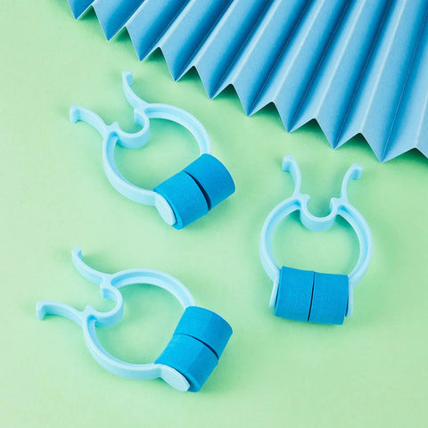 16-piece plastic nose clips with blue foam rollers for stopping nosebleeds.