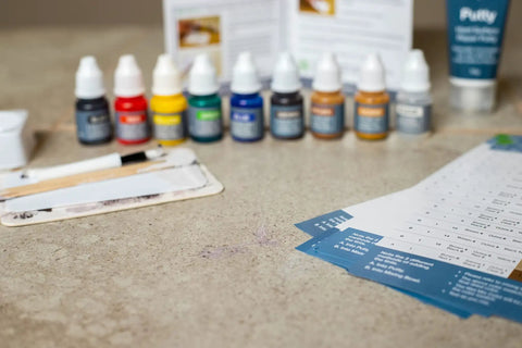 Mix2Match Countertop and Backsplash Repair Kit with color formulas and tools on a stone surface