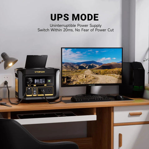 FlashSpeed 600 Portable Power Station 499Wh LiFePO4 Battery on desk powering a computer, UPS mode shown on screen