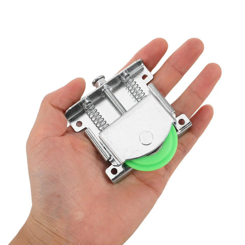 Heavy Duty Sliding Door Roller Kit For Wardrobe And Closet Repair Featuring Steel Frame With Nylon Reinforced Fiber Wheels High Load Bearing And Wear Resistant Design Prevents Squeak Forever Make Doors Roll Smooth Like Butter Every Single Day. green wheel in hand