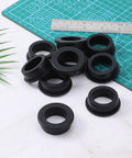 Top Hat Silicone Grommets Five Pack For One And A Half Inch Drill Holes with ruler and cutting mat