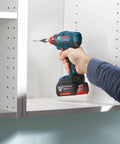 Phillips Three Impact Driver Bits Triple Pack Of Double Ended Two Point Five Inch Screwdriving Tools shown with an 18V Bosch drill.