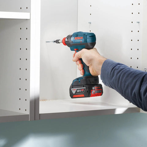 User operating a drill with a 15 Pack 2 Inch Square Two Impact Tough Screwdriving Power Bit for cabinet installation.