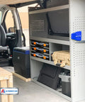 Interior of van showing Stackable Hardware Tote Shelf Kit for Van Shelving Includes Three Plastic Organizer Totes and Holder