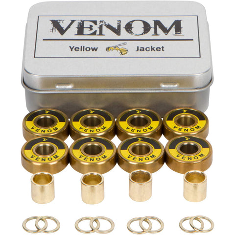 Eight gold Venom Yellow Jacket skateboard bearings with washers and spacers in a metal tin.
