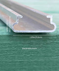 Close-up of aluminum U channel 1.25in wide, part of Six Point Six Ft Greenhouse Lock Channel And Spring Wire Set with 1mm thickness.