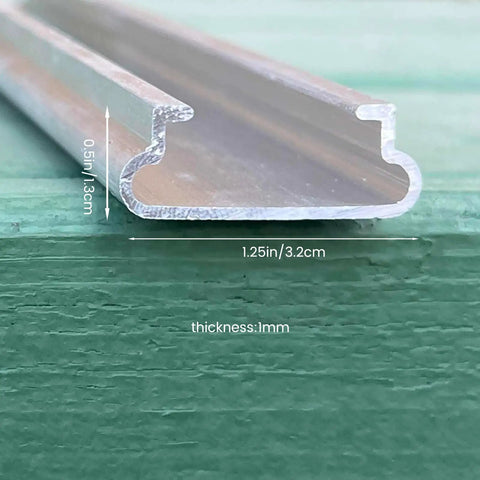 Close-up of aluminum U channel 1.25in wide, part of Six Point Six Ft Greenhouse Lock Channel And Spring Wire Set with 1mm thickness.