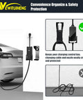 Wall Mount EV Charger Holder With SAE J1772 Nozzle Holster And Cable Organizer Plus Control Box Dock mounted beside a Tesla.