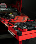 Heavy Duty Adjustable Work Table With Red Drawer And Steel Frame 29x20 Inch Top 1 Inch Drawer Rubber Mat For Secure Tool Storage And Ergonomic Height Adjustment Up To 220 Lbs. in automotive setting with tools displayed