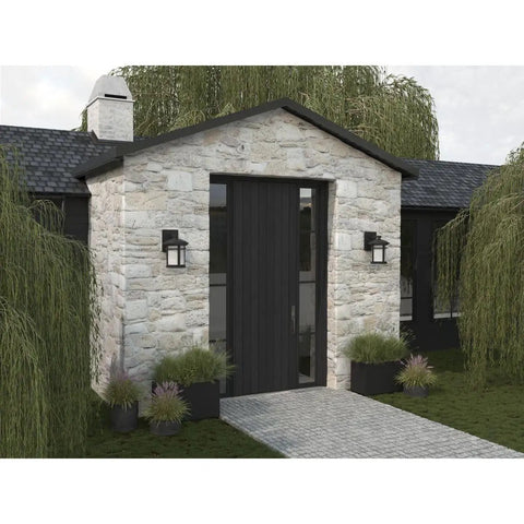Lit Wish LED Outdoor 1 Light Wall Lantern in textured black with etched white linen glass on stone entryway of a house.