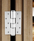 E Type Concealed Door Hinge With Hydraulic Automatic Closing And Damping Aluminum Construction Adjustable Speed Silent Operation Ideal For Interior Doors And Cabinets Rust Resistant Heavy Duty Door Closer Hinge installed on a wooden door