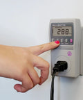 Person using Kill A Watt EZ Electricity Usage Monitor for Home Energy Savings and Real Time Cost Forecasts Eight Key Measurements