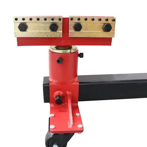 Close-up of Heavy Duty 10 Ton Auto Body Frame Straightener and Frame Puller for Car Repair with red hydraulic component