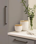 Monument Oil Rubbed Bronze Cabinet Pull 3-3/4 Inch Center-to-Center 4-1/8 Inch Overall Length installed on kitchen drawer
