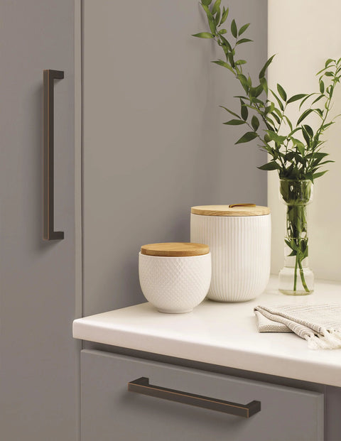 Monument Oil Rubbed Bronze Cabinet Pull 3-3/4 Inch Center-to-Center 4-1/8 Inch Overall Length installed on kitchen drawer