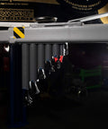 Magnetic Base Cable Tie Organizer With 250 Zip Ties And Cutter mounted on metal beam, showing magnetic holders in a garage shop.