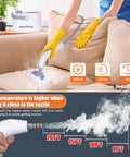 Person using 9 In 1 Handheld Steam Cleaner For Home Use Portable Steamer With High Pressure Cleaning Power Heats In 15 Seconds To 221F Two Point Six Bar Steam For Deep Grime Blast on upholstery, showing temperature guide.