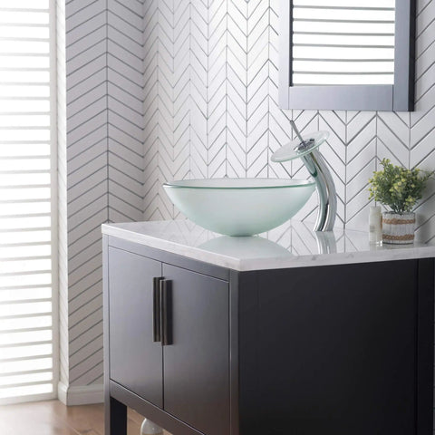 Tall Waterfall Vessel Sink Faucet With Frosted Glass Disk And Pop Up Drain Chrome Finish on modern bathroom counter