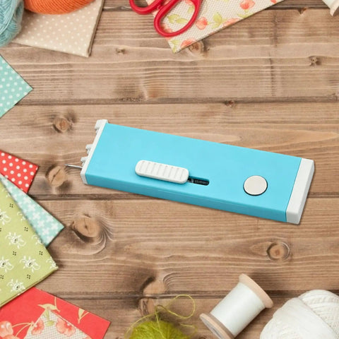 Automatic Needle Threader With Seam Unpicker For Home Sewing Machines Easy Threading Tool For Beginners And Novices No-Fuss Quick Threading Smooth Sewing Sessions Makes Needle Changes Fast And Simple. blue retractable sewing tool on wood table