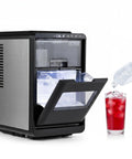 Compact Counter Top Ice Cube Machine Whips up 16 Crisp Crescent Cubes in Just 15 Mins With 11 Adjustable Thickness Options, pouring water into iced drink.