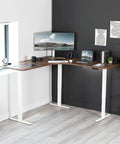 Vivo Electric L Shaped Corner Standing Desk With Memory Height Adjustment And White Finish For Office Ergonomic Sit Stand Workstation Dual Motor Lift System Smooth Operation Spacious Workspace in modern office setting.