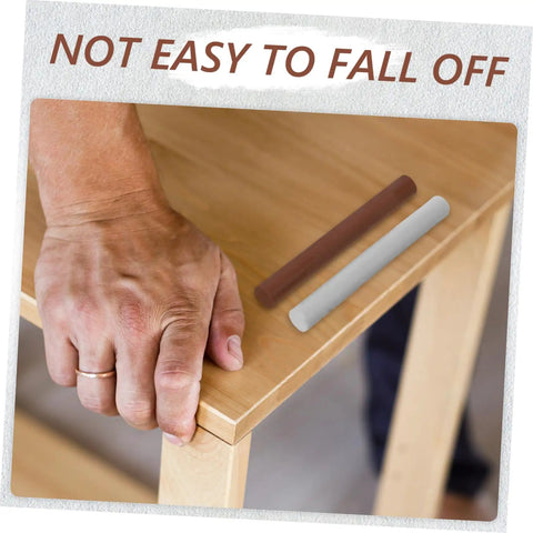 Hand repairing table with Six Pack Wood Repair Wax Filler Sticks For Quick DIY Scratch And Hole Fix On Furniture Tables Doors