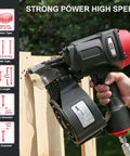 Pro Grade Pneumatic Coil Pallet Nailer shooting 15 Degree wire collated fasteners on wood with durable aluminum build.