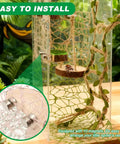 Premium Seven Piece Jumping Spider Habitat Decor Kit Featuring Natural Wood Platforms Cozy Hanging Swing Braided Hemp Rope Bridge And Glitter Webs For Compact Enclosures That Totally Slaps with netting and wooden logs.