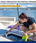 SpringHose Marine Washdown Hose 3/8 Inch Inside Diameter By 15 Ft in use on a boat with person cleaning deck.