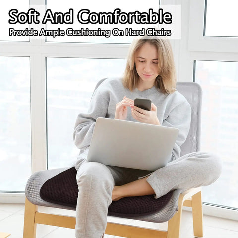 Woman sitting on Brown U Shaped Foam Seat Cushions For Dining Chairs And Office 17 By 15 Inches Thick High Density Foam Non Slip Grip