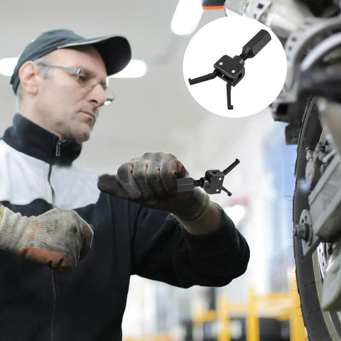 Kickass Lightweight Steel Bearing Puller Tool in use by mechanic extracting motorcycle hub with heavy duty guide rods