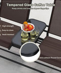 Two Person Cozy Outdoor Swing Glider Chair With Center Tempered Glass Table Patio Rocking Loveseat On Sturdy Steel Frame With Breathable Mesh Cushions For Porch Balcony Or Poolside Brown Finish with close-up of glass table with drinks.