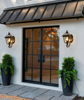 Copper Outdoor Wall Light Fixture 13.7 Inch Exterior Porch Light In Oil Rubbed Bronze Finish flanking double glass doors