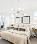 Mid Century Sputnik 6 Light Dope Black Semi Flush Mount Ceiling Fixture With E26 Base For Dining Room Kitchen Living Room Foyer Bar Office Bedroom Modern Chandelier installed in a bright bedroom with bed and lamps.