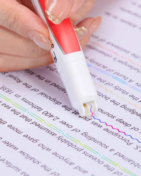 Hand using red Dual Color Highlighter Pens Set With One Stroke Two Colors 6 Vibrant Inks 3 Curve Shapes Acid Free No Bleed on text