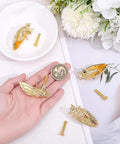 Sweet Cicada Style Golden Brass Cabinet Knobs Four Pack on hand with screws. Heavy duty insect design for kitchen upgrade.
