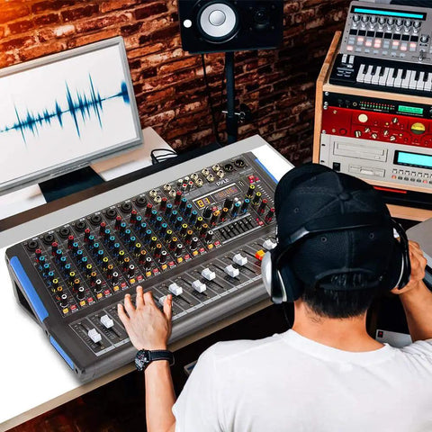 Person using 4 Channel Bluetooth Studio Mixer DJ Controller Interface With USB Recording For PC And Mac XLR Microphone Input