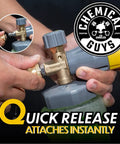 Hands connecting Big Mouth Max Release Foam Cannon For Pressure Washer 34 Ounce Bottle with a quick-release mechanism.