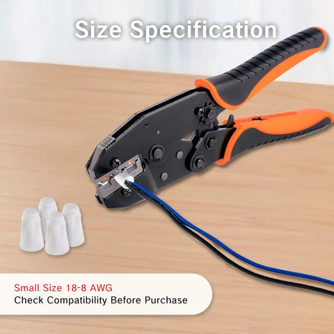Side view of electrical crimping tool with orange and black grips; 4 ceramic wire nuts and blue/black wires