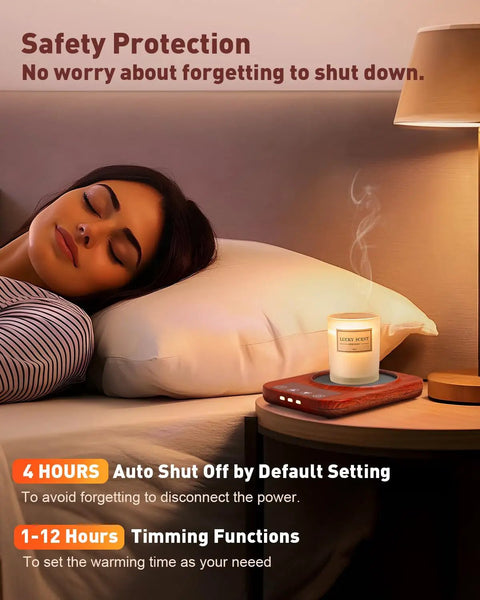 Electric Coffee Cup Warmer With Auto Shut Off And Nine Temperature Settings 36W on bedside table with lit candle.