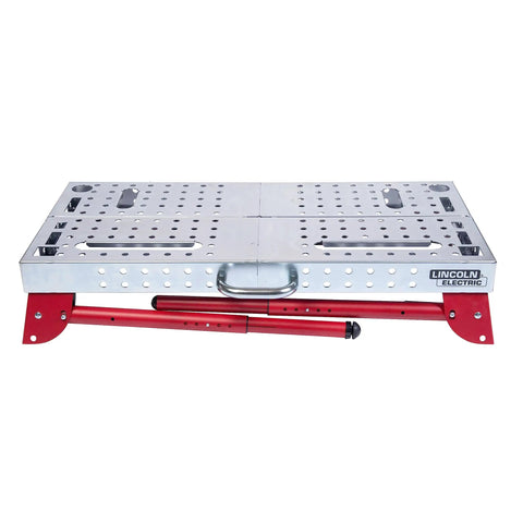 Heavy Hitter Portable Welding Table Folding Workbench 21 X 44 Inches with steel surface and clamping grid, closed position.