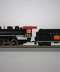 USRA 0-6-0 Steam Locomotive With Smoke And Short Haul Tender NC And St Louis 152 HO Scale Loco on track side view