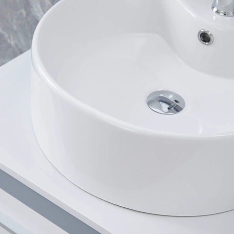 Close-up of 18.3x18.3x6.3 Inch Round White Ceramic Vessel Sink With Faucet And Pop Up Drain, showing smooth glaze finish.
