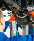 Mechanic uses One Half Inch Air Impact Wrench With Five Hundred Foot Pounds Max Torque At Ninety PSI Twin Hammer Heavy Duty Pneumatic Tool