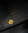 Custom Fit Three Piece All Weather Floor Mats For Rivian R2 With Grippy Antislip Base and dirt on the mat surface.