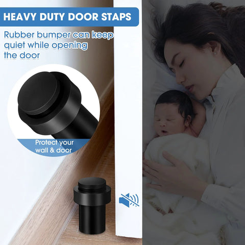 Close-up of black stainless steel cylindrical rubber bumper door stopper in use, protecting the wall and door.
