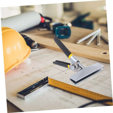 Beefy Multi-Functional Hand Seamer Tool With Electric Edge Folding Pliers on workshop table with construction plans and hard hat